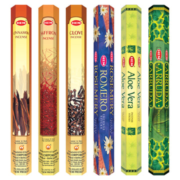 Six boxes of HEM incense sticks in various scents: Cinnamon, Saffron, Clove, Rosemary, Aloe Vera, and Arruda, displayed side by side.